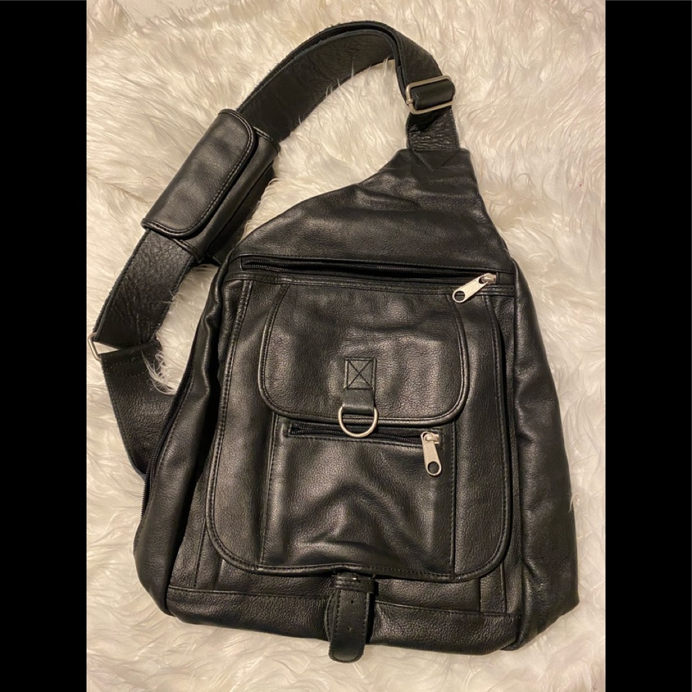 Genuine heavy leather cross shoulder backpack